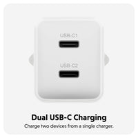 A white dual USB-C charger with two USB-C ports labeled USB-C1 and USB-C2, shown on a light gray background with the text 'Dual USB-C Charging' and 'Charge two devices from a single charger.'.