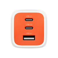 An orange and white multi-port USB charger with three USB-C ports and one USB-A port, shown on a solid white background.